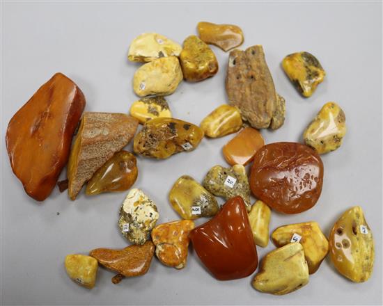 Approximately twenty six pieces of assorted raw amber.